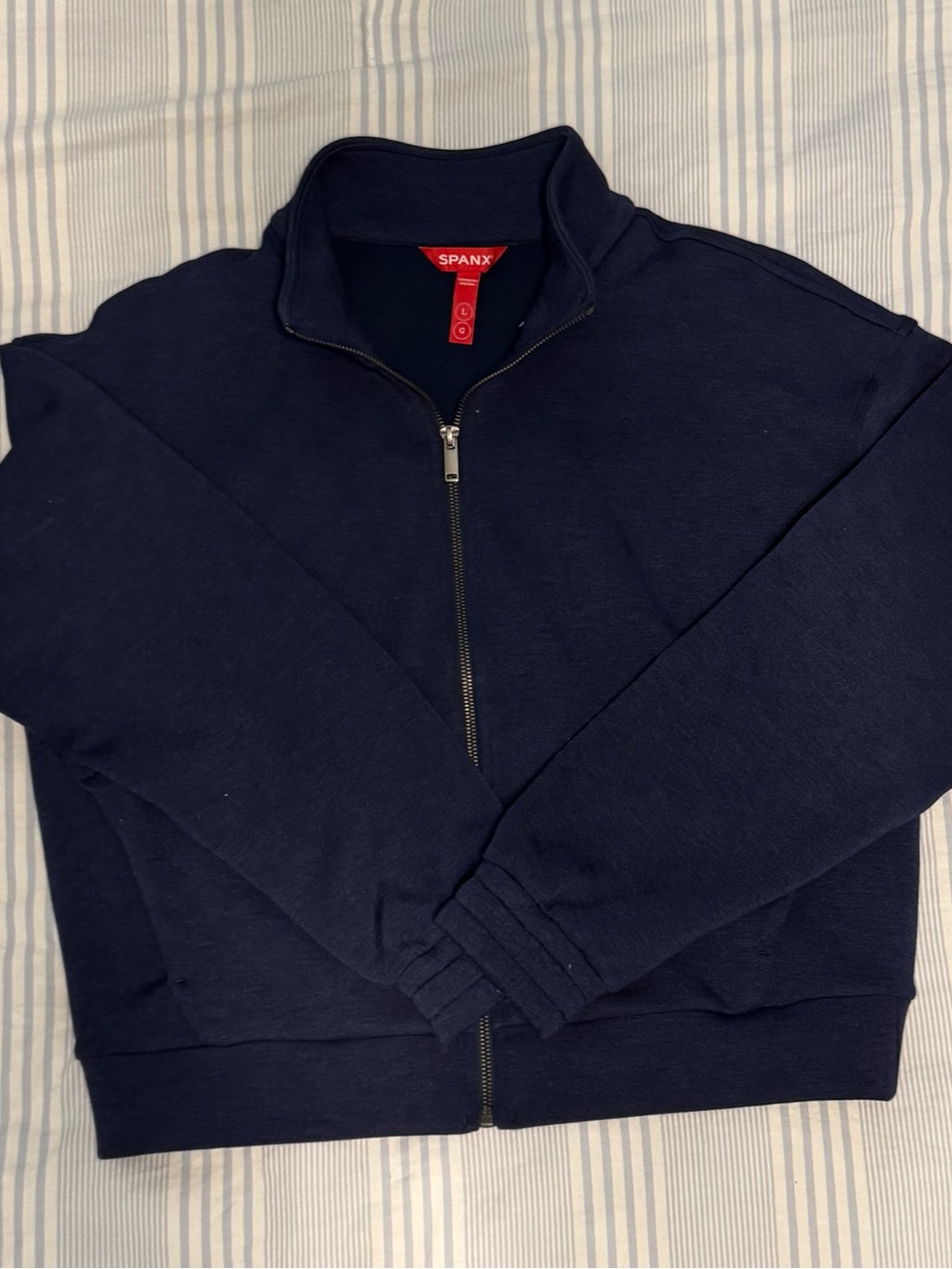 Navy SPANX Air Essentials zip up jacket